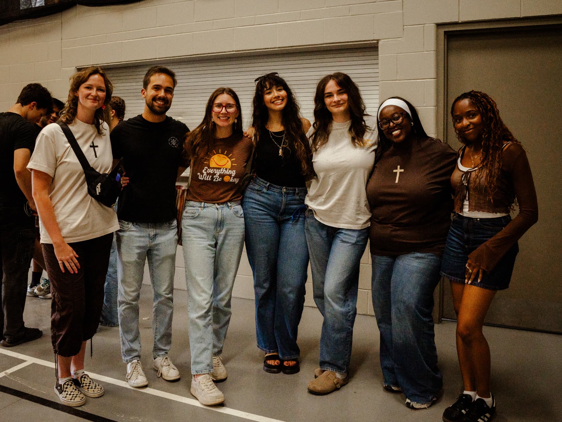 A group of the Souled Out team smiling together after a night of worship