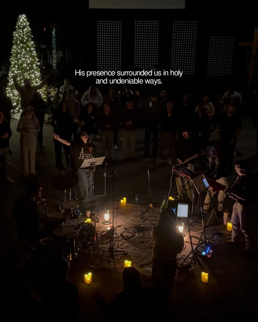 A candlelit worship gathering surrounded by God's presence