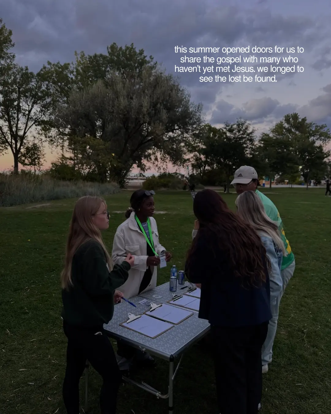 Souled Out volunteers welcoming people at an outdoor summer gathering