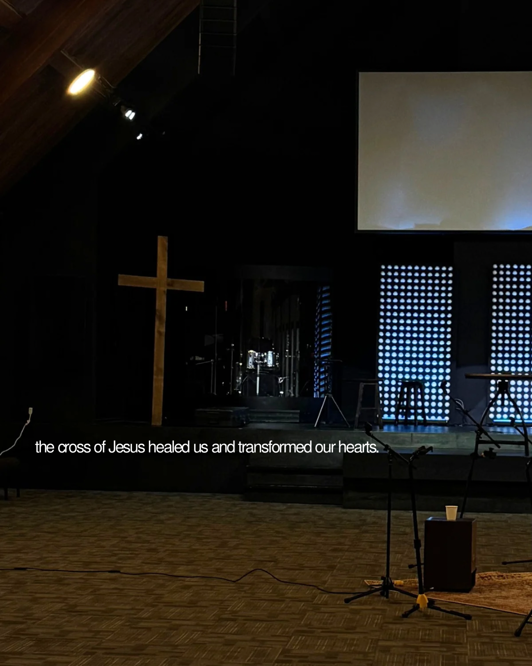 The cross of Jesus at the front of the worship room